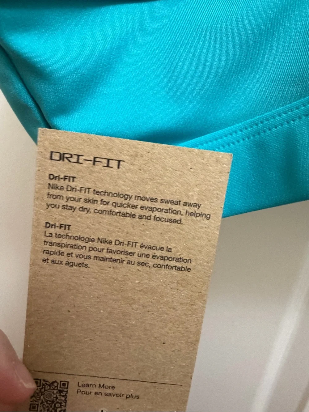 Nike Women’s Teal Sports Bra with White Swoosh